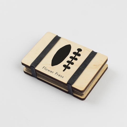 Pocket Flower Press with bold black abstract design by Studio Wald