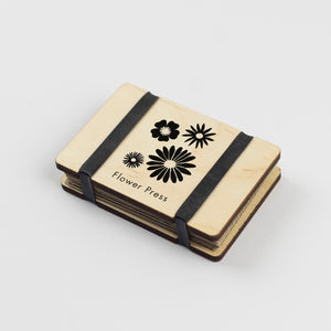 Mini Flower Press With Floral Silouette Design by Studio Wald
